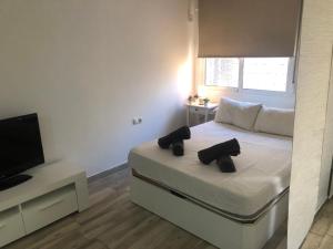Postel nebo postele na pokoji v ubytování Precioso loft centrico