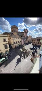 a view of a city with buildings and a street at alloggio turistico P. Fontana Grande in Viterbo