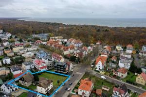 an aerial view of a small town with houses at BALTIC VIBES APARTAMENT in Kołobrzeg