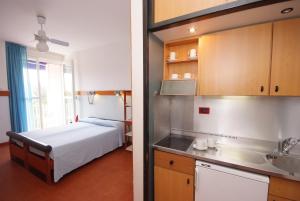 Postel nebo postele na pokoji v ubytování Residence Elite