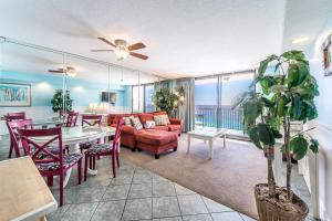 a living room with a couch and a table at SunDestin 1703 in Destin