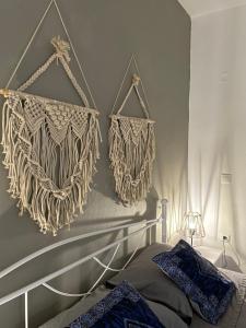 A bed or beds in a room at ARDANI BAY STUDIO FAMILY APARTMENT