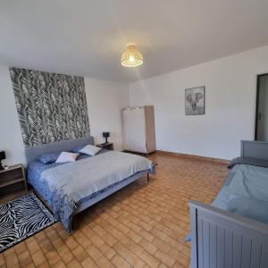 Posteľ alebo postele v izbe v ubytovaní A la 4L + 2 fotografie