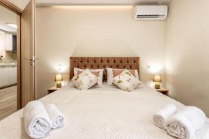 Posteľ alebo postele v izbe v ubytovaní Arch Apartment Corfu