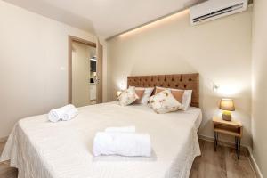 Posteľ alebo postele v izbe v ubytovaní Arch Apartment Corfu