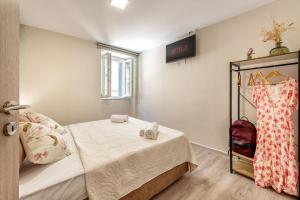 Posteľ alebo postele v izbe v ubytovaní Arch Apartment Corfu