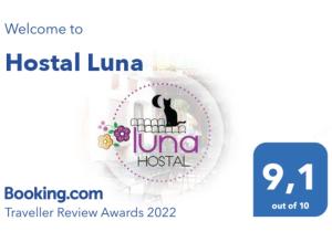 a sign that says hospital luna with a cat on it at Luna in Taxco de Alarcón
