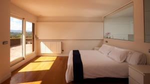 Posteľ alebo postele v izbe v ubytovaní Singular y espacioso apartamento Ondarreta Beach