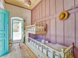 Posteľ alebo postele v izbe v ubytovaní Petridi House