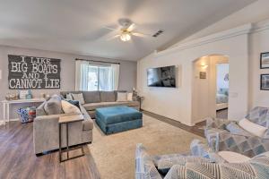 a living room with furniture and a ceiling fan at Lake Havasu Home with EV Charger Near Launch Ramp! in Lake Havasu City