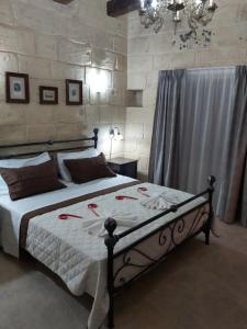 The Hidden Gem Boutique Hotelにあるベッド
