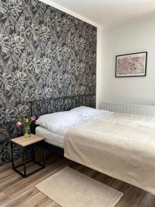 Postel nebo postele na pokoji v ubytování Lovely 1-bedroom apartment at heart of Budapest