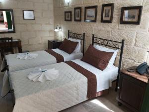The Hidden Gem Boutique Hotelにあるベッド