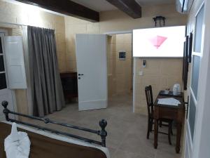 The Hidden Gem Boutique Hotelにあるテレビまたはエンターテインメントセンター