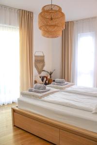 Säng eller sängar i ett rum på Apartament Przy Plaży Arka , z widokiem na Morze :)