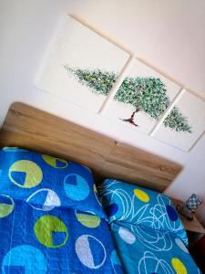 Łóżko lub łóżka w pokoju w obiekcie Casa Alessandria