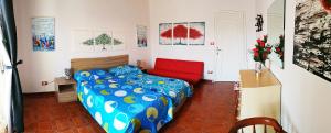 Łóżko lub łóżka w pokoju w obiekcie Casa Alessandria