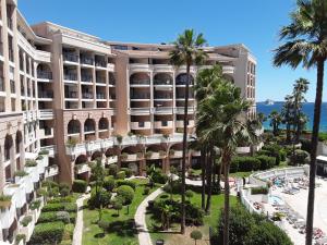 a view of the resort from the balcony at Appartement Palm d'Azur in Cannes
