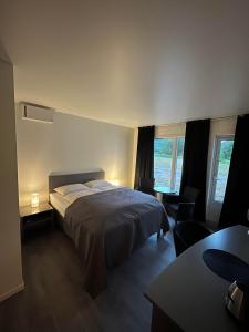 Postel nebo postele na pokoji v ubytování Senja Living + 37 fotografií