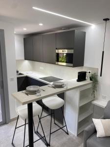 Kuchyňa alebo kuchynka v ubytovaní Cannes - Magnifique studio moderne