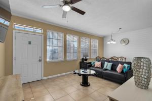A seating area at Poinciana Place #123