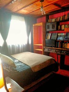 Llit o llits en una habitació de Hostal Casa Galerna de La Montaña