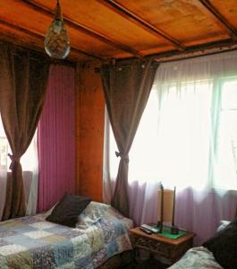 Llit o llits en una habitació de Hostal Casa Galerna de La Montaña