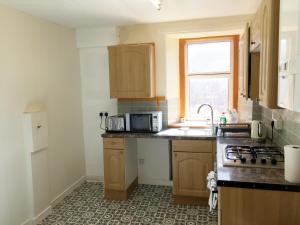 Køkken eller tekøkken på Dunbar Serviced Apartment