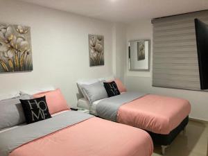 Katil atau katil-katil dalam bilik di Hermoso Apartamento en el Rodadero, a tan sólo una cuadra de la playa!