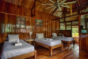 Postel nebo postele na pokoji v ubytování Ecoamazonia Lodge + 32 fotografií