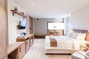 TV a/nebo společenská místnost v ubytování Saksiam Lakeside Resort