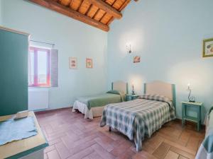 Ένα ή περισσότερα κρεβάτια σε δωμάτιο στο Holiday Home in Sellano with Pool & Sun Terrace +32 φωτογραφίες