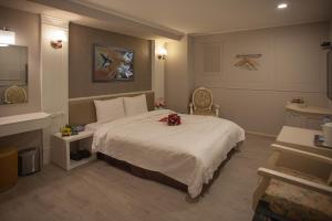Voodi või voodid majutusasutuse Showart Hotel toas
