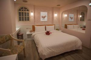 Voodi või voodid majutusasutuse Showart Hotel toas