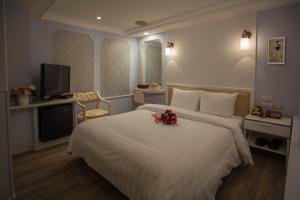 Voodi või voodid majutusasutuse Showart Hotel toas