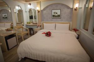Voodi või voodid majutusasutuse Showart Hotel toas