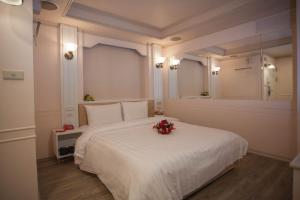Voodi või voodid majutusasutuse Showart Hotel toas