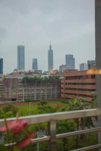 a view of a city with buildings in the background at Showart Hotel in Taipei