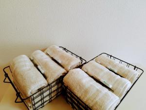 Hachiken Chaya 2F 1-6ppl客房内的一张或多张床位