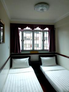 Cama o camas de una habitación en Hang Fung Hostel