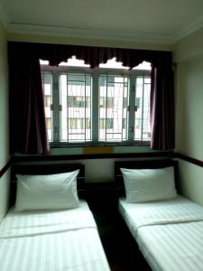 Cama o camas de una habitación en Hang Fung Hostel
