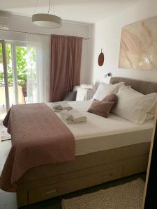 Postel nebo postele na pokoji v ubytování Studio apartment Purple sunset - 2+1