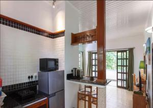 Kuchyň nebo kuchyňský kout v ubytování La Digue Self-Catering Apartments