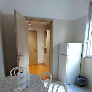 Kuchyň nebo kuchyňský kout v ubytování Genova Rooms Serra C