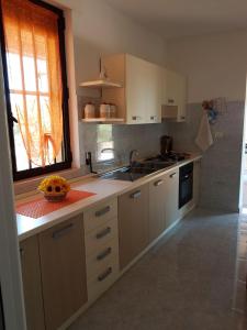 A kitchen or kitchenette at Casetta in Salento