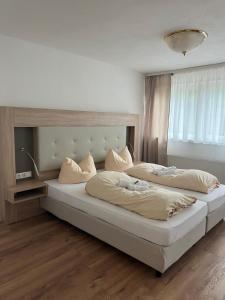 Postel nebo postele na pokoji v ubytování Hubertus-Hof