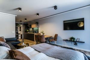 Posteľ alebo postele v izbe v ubytovaní Apart-Center Antalovka Spa