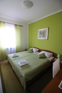 Ένα ή περισσότερα κρεβάτια σε δωμάτιο στο Apartment Marija
