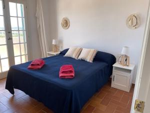 Postel nebo postele na pokoji v ubytování VILLASTAR by SOM Menorca + 8 fotografií