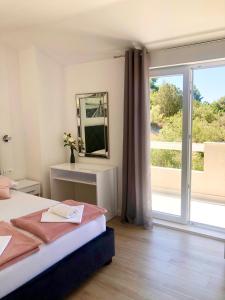 Posteľ alebo postele v izbe v ubytovaní Hotel B&B CHAMBERLAIN